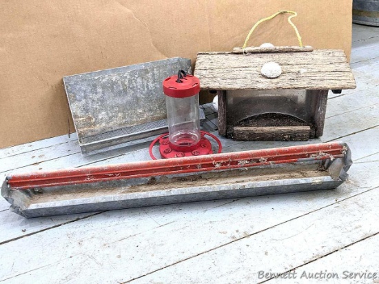 Pickup in Rib Lake. Hummingbird feeder, chicken feeder trough, other bird feeders.