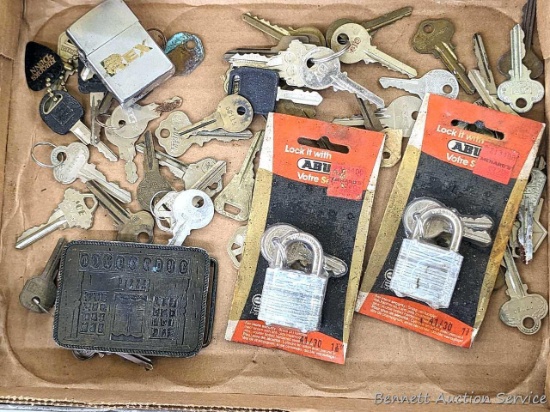 Pickup in Rib Lake. Assorted keys and locks; Zippo lighter, 3-1/4" brass Tombstone pizza belt