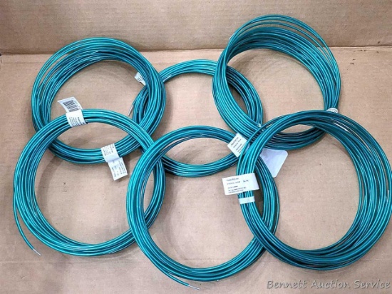 Six coils of Dand-O-Line anchor wire are all about 9" wide.