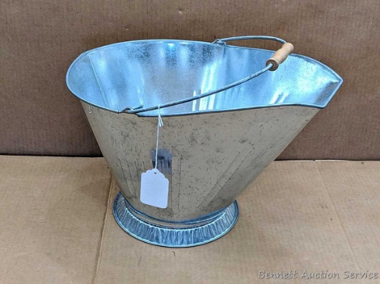 New galvanized coal hod or scuttle with wooden handle is about 17" long.