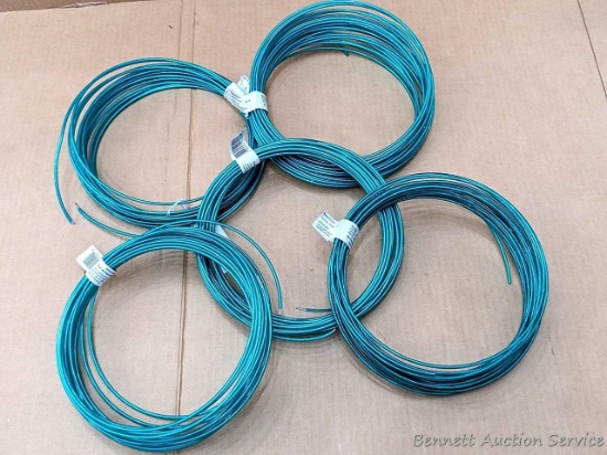 Five coils of Dand-O-Line anchor wire are all about 9-1/2" wide. One coil feels a little thinner.