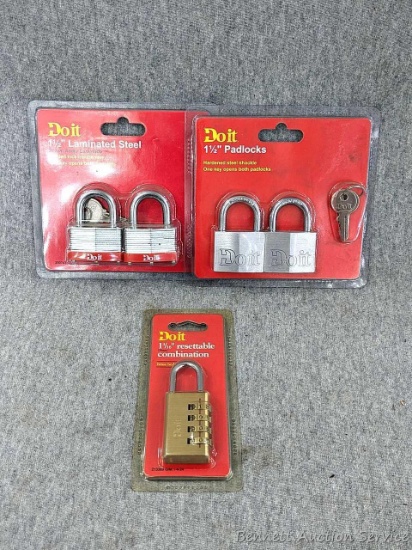 Four Do It 1-1/2" padlocks and a resettable combination lock.