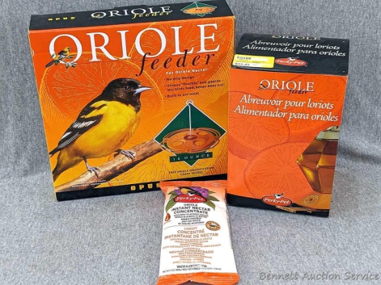 Perky Pet oriole feeder, Opus Oriole feeder and 1 package of oriole instant nectar concentrate.