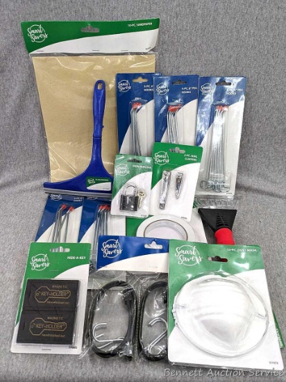 Rubber tie downs, 6" peg hooks, dust masks, glass squeegee, ice scraper, nail clippers, more