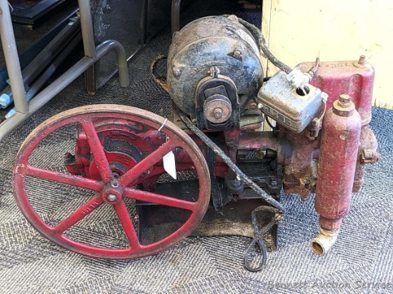 Eye-catching Red Jacket brand early style piston pump for crude oil, water or what-have-you. 27"