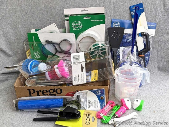 Garlic press, fridge and freezer containers, mini hack saw, liquid measuring cup, kitchen scrubbies,