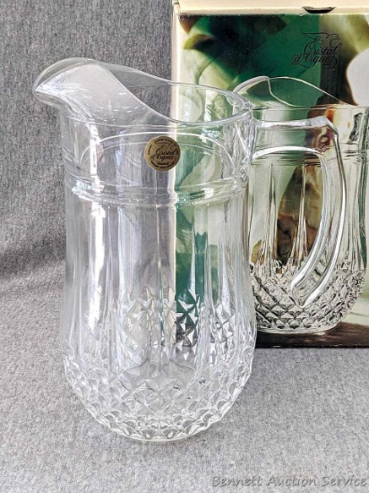 Cristal d'Arques Longchamp pitcher made of pressed glass made in France; measures 9" tall. Box