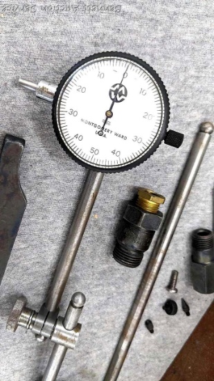 Precision dial indicator set is thousandth reading with .200 range and comes in a nice mahogany box.
