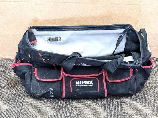 Nice 20" Husky tool tote is in good condition. About 12" wide and tall. Lots of pockets in and out;