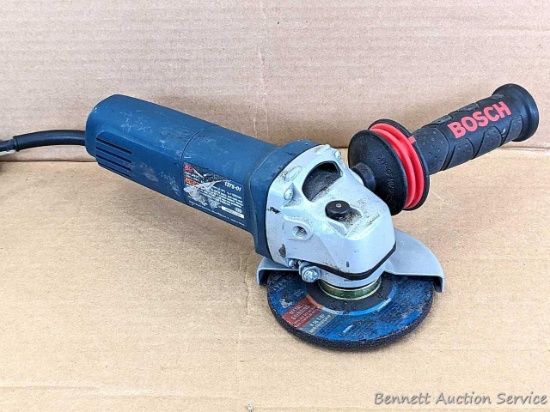 Bosch 4-1/2" grinder with wrench is Model 1375-01. Runs.