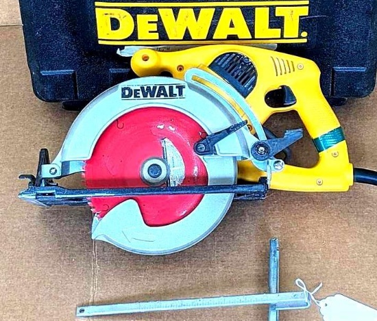 DeWalt DW378G 7-1/4" framing saw has cutting depth and bevel angle adjustments. Runs, cord is taped.