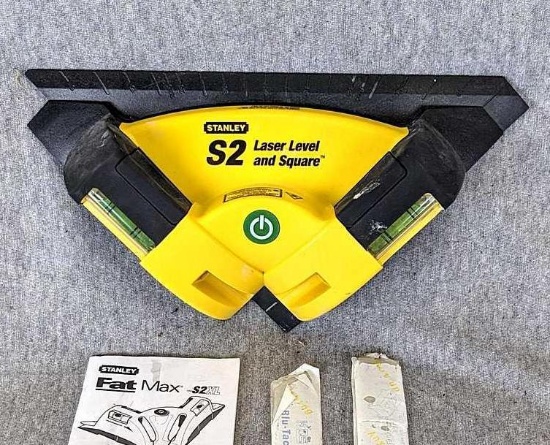 Stanley Fat Max S2 laser level and square with manual and adhesive tack. Needs batteries, some rust