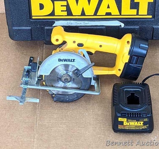 DeWalt DW936 trim saw takes 5-3/8" saw blades. Features bevel and depth adjustment, and has kerf