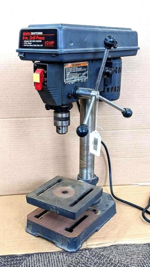 8" Craftsman three-speed drill press has a 1/2" chuck and 1/3 hp motor. Cast iron base, tiltable