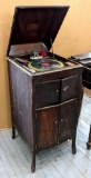 Antique Victor 'Victrola' upright record player was made by the Victor Talking Machine Co. and has
