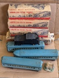 Pickup in Rib Lake. American Flyer Lines model train cars and coal tender. Longest is approx 14