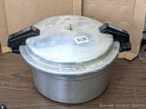 Pickup in Rib Lake. Mirro 12 quart pressure cooker or canner with weight, seal, rack, manual.