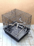 Pickup in Rib Lake. Bird cage with enrichment equipment included. Measures 14-1/2