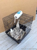 Pickup in Rib Lake. Guinea pig or other small animal cage and watering bottle measures 14-1/2