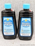 2 Medallion clear lamp oil bottles. Each 18 fl oz appear to be full and unused.