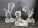 Pickup in Rib Lake. Trio of glass horses, tallest is 5