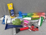 Variety of car accessories incl Windshield de-icer, scrapers, static dusters, charging blocks and