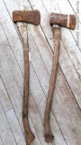 Pickup in Rib Lake. Two rustic single bit axes are each approx. 3' long.