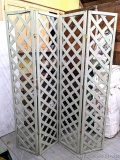 Pickup in Rib Lake. 4-pieces of hinged lattice or trellis. Could be used to hang pictures on a
