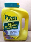 Unopened 5.6 lb jug of Preen Garden Weed Preventer plus Plant Food that covers 900 sq ft.