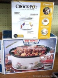 Pickup in Rib Lake. Two new looking crock pots, larger is 5 1/2 gallon and the smaller one is 4 QT,