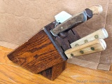 Pickup in Rib Lake. Wooden knife block with knives and sharpening stone by Chicago Cutlery; plus
