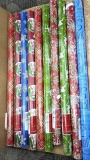 Eleven rolls of festive Christmas wrapping paper are all about 2-1/2' wide.