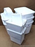 Five 28 qt coolers with lids and a couple smaller.