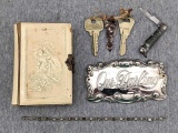 Tiny pocket knife, small book in German, keys and more; book measures 2-3/4