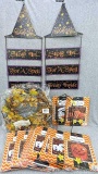 Autumn themed lighted wreath, plethora of giant lawn bags, and small 12