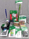 Small organizing baskets, rubber bands, glass squeegee, duct tape, scrubber sponges, hide-a-key, fly