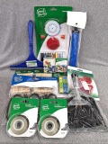 Sewing kit, manual pencil sharpeners, hand pump, squeegee, clothes pins, small broom and dustpan