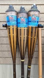 NIP Set of 6 Tiki Torches stand 5 ft tall.