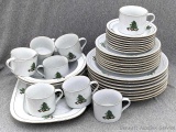 Holiday Hostess china with an eight place setting that includes 10