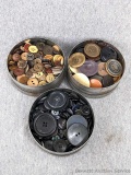 3 metal tins of vintage buttons, semi-sorted by color. Tins measure approx 4