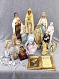 A huge assortment of Mary figurines. Tallest is 13