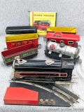 Vintage Mar Toys locomotive and cars, railway splitter, more. Engine about 8-1/4