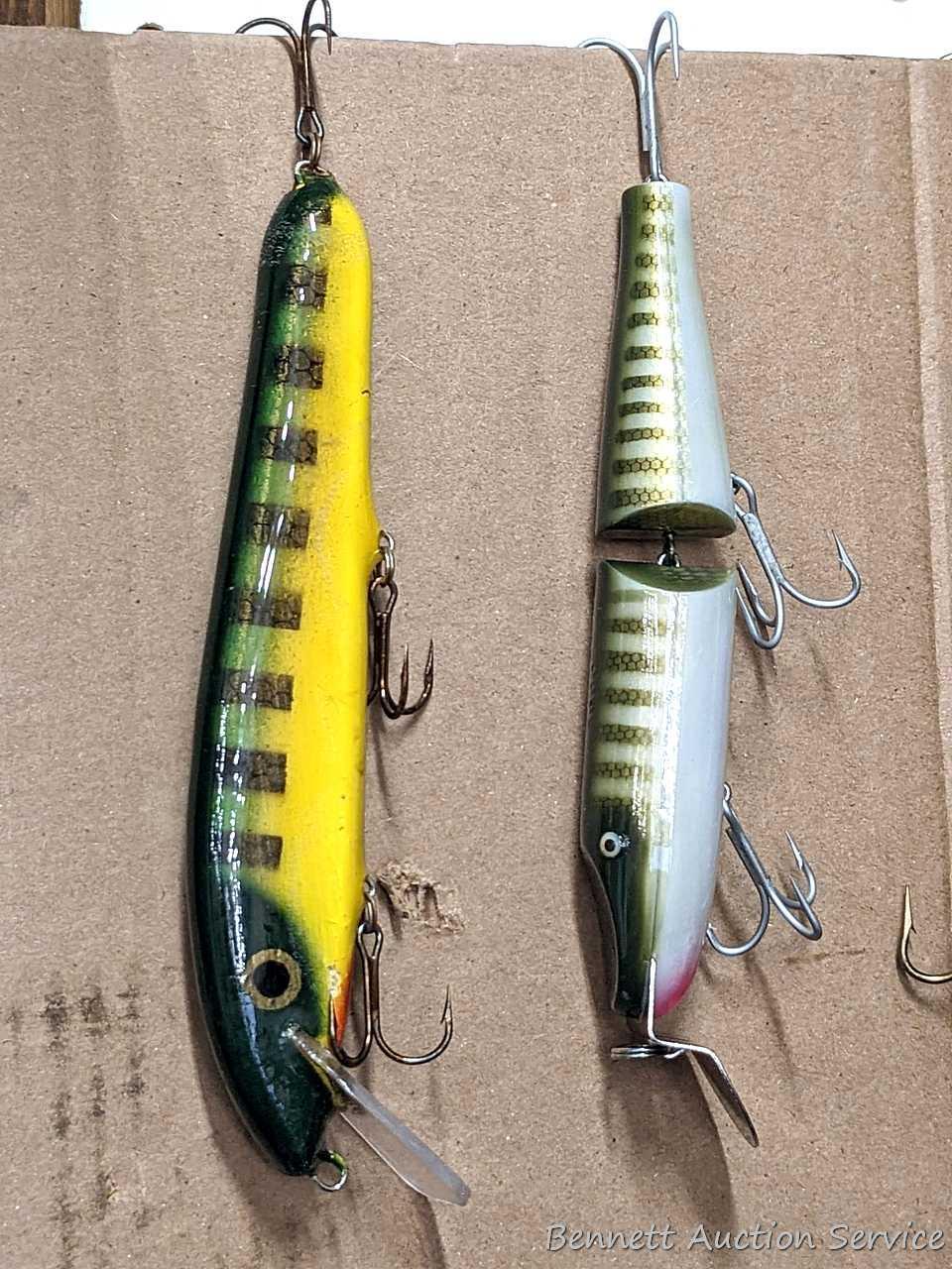 Six large fishing lures including Cisco Kid