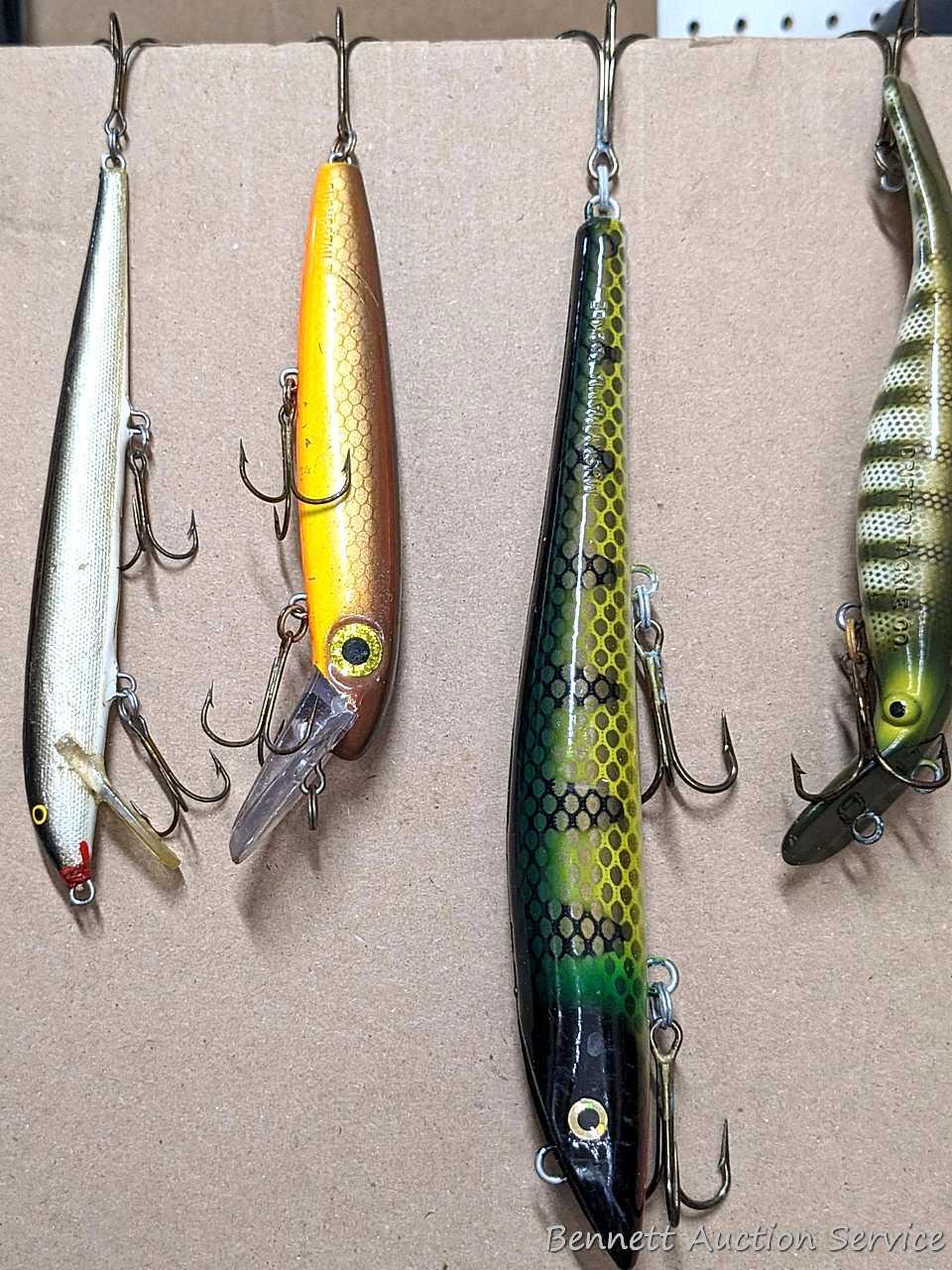 Six large fishing lures including Bagley's DB-06