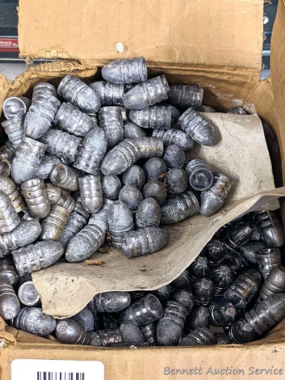 Approx 42 pounds of lead bullets, measure .575 in diameter and 1.04 tall.