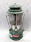 Coleman Model 220F dual-mantle lantern is date coded 12 67 on bottom. Stands 14