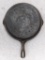 Griswold No. 8 cast iron skillet with large logo is marked Erie PA USA, 704 P. Measures 10-1/2