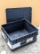 Two sturdy shipping containers are in good condition and would be handy for truck-bed storage.
