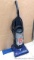 Bissel Powerforce Helix vacuum cleaner picks up debris and hose has suction. Stands 45