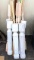 Various spindles, wooden dowels, stairway handle, possibly more. Chunky white wooden pedestals are